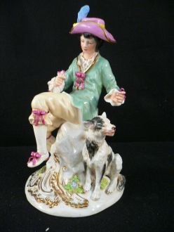 Gentilhomme en porcelaine et chien